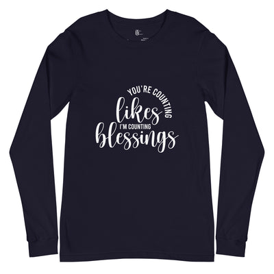 Blessings or Likes Long Sleeve with image displays in white "You're Counting Likes, I'm Counting blessings. Shown in navy.