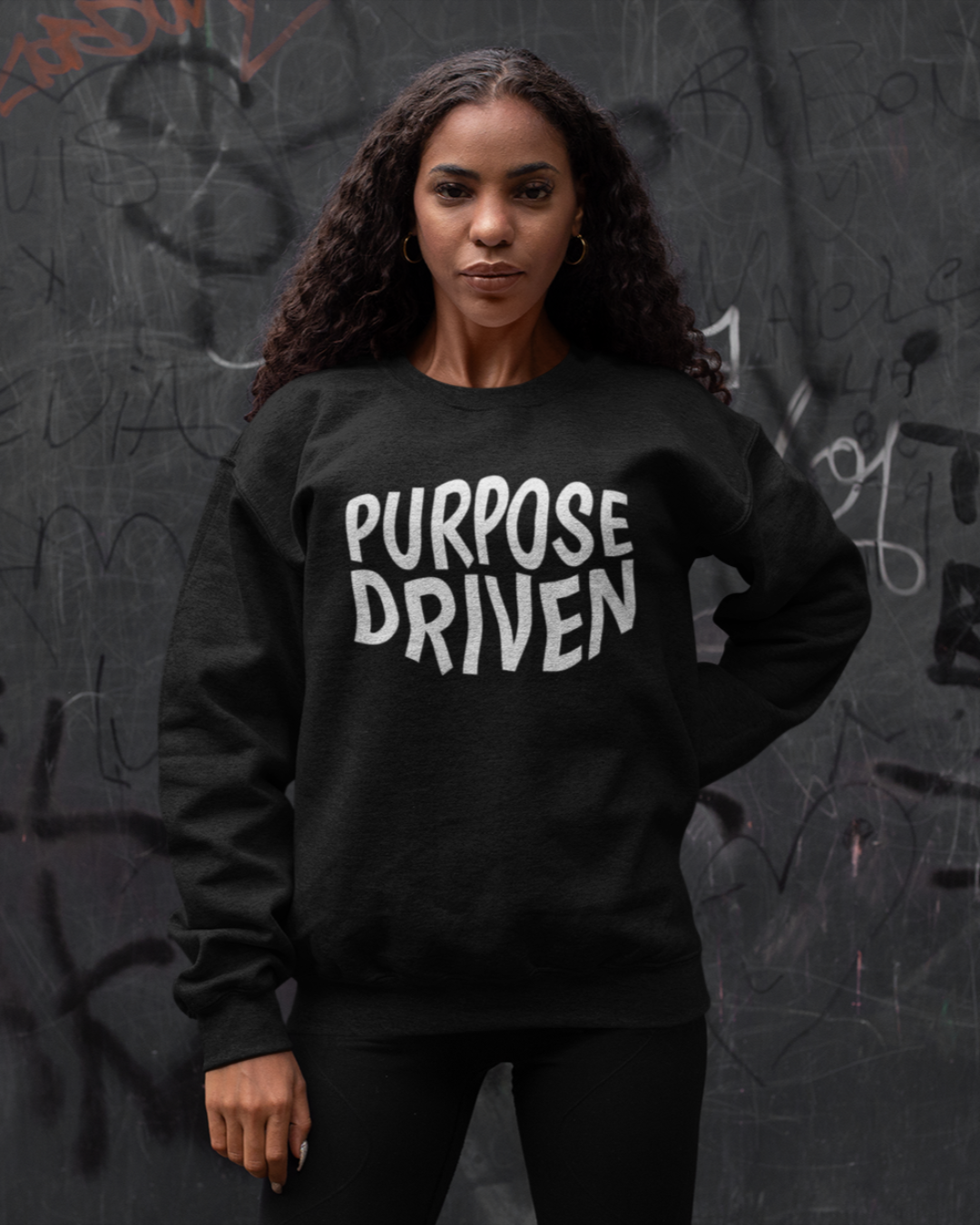 Purpose Driven black sweatshirt. Design message "Purpose Driven". Sweatshirt is a standard length.  Fabric is soft on skin. 
