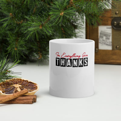 White Glossy ceramic Mug that as image in red and black that reads, "In everything give thanks"